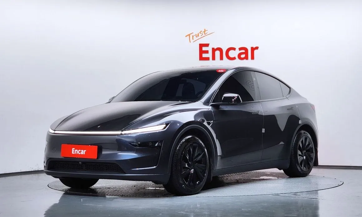 Tesla Model Y — фото 1