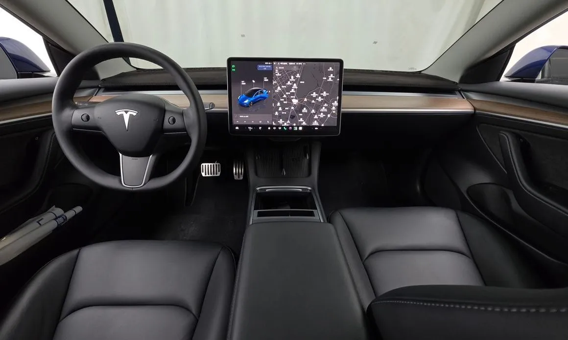 Tesla Model 3 — фото 7