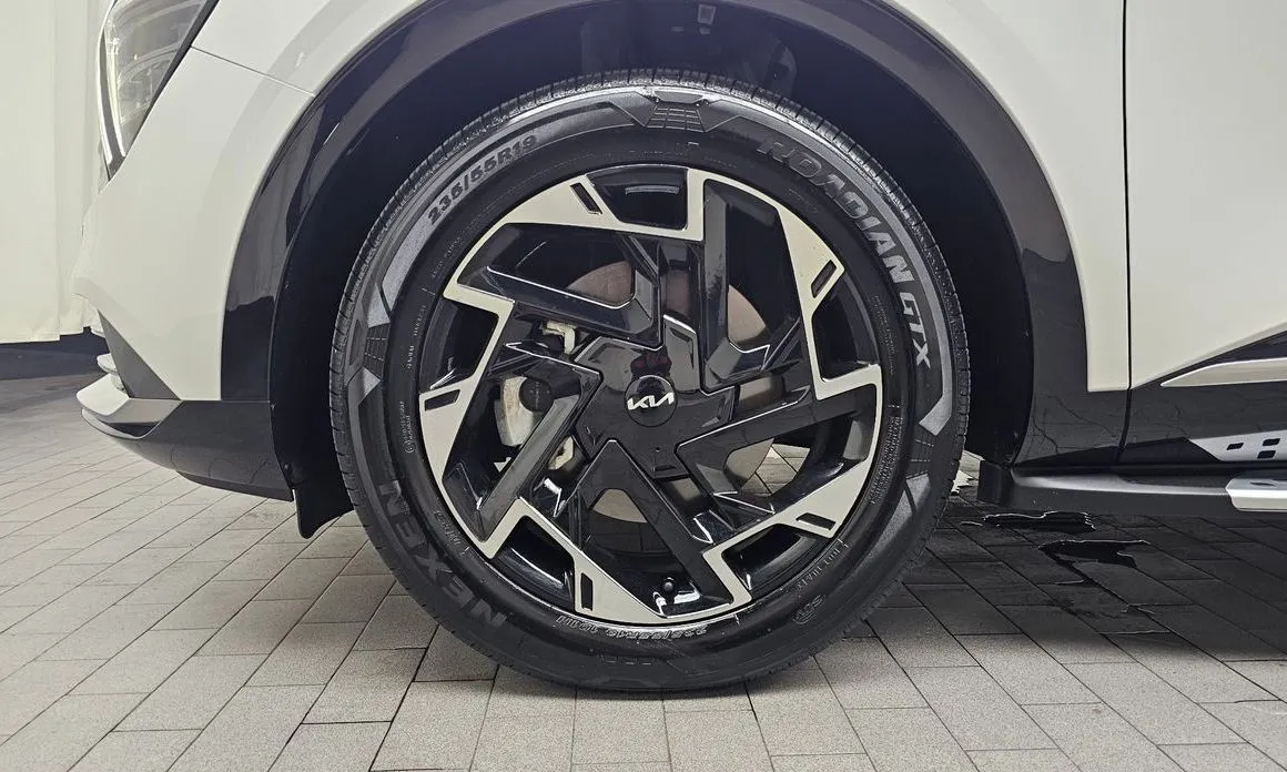 Kia Sportage — фото 10