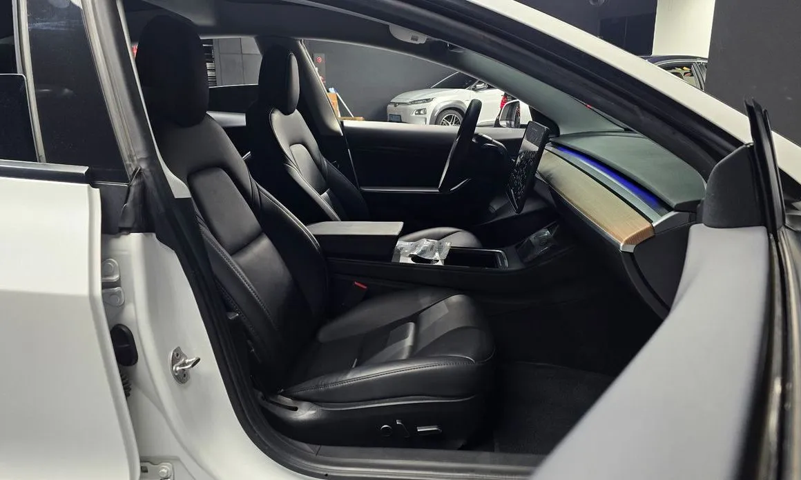 Tesla Model 3 — фото 10