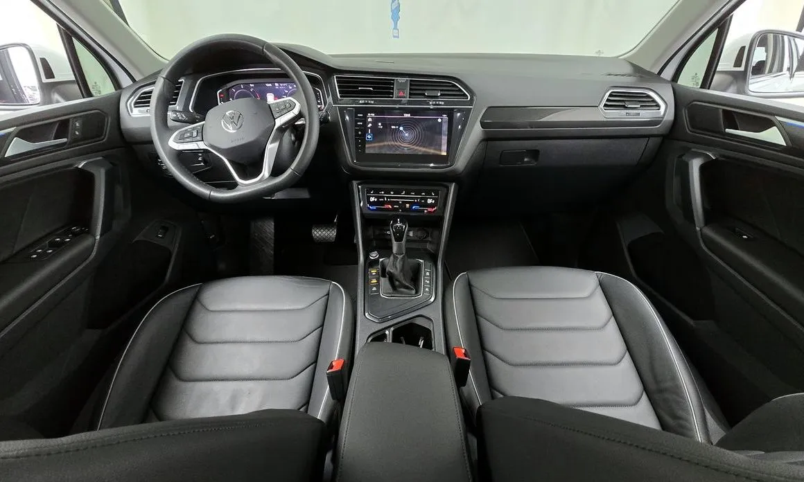 Volkswagen Tiguan — фото 7