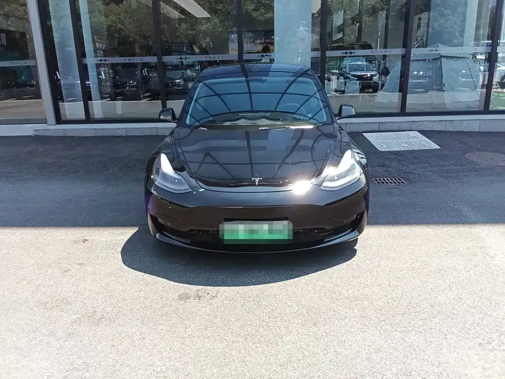 Tesla Model 3 — фото 7