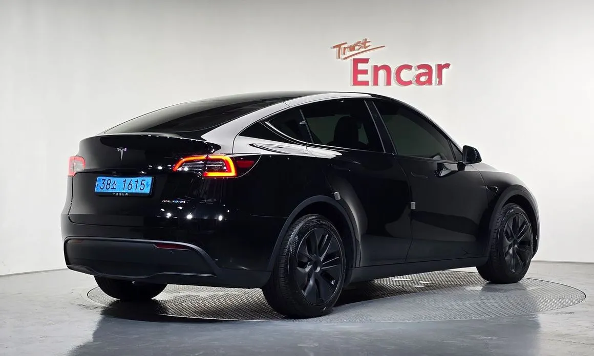 Tesla Model Y — фото 7