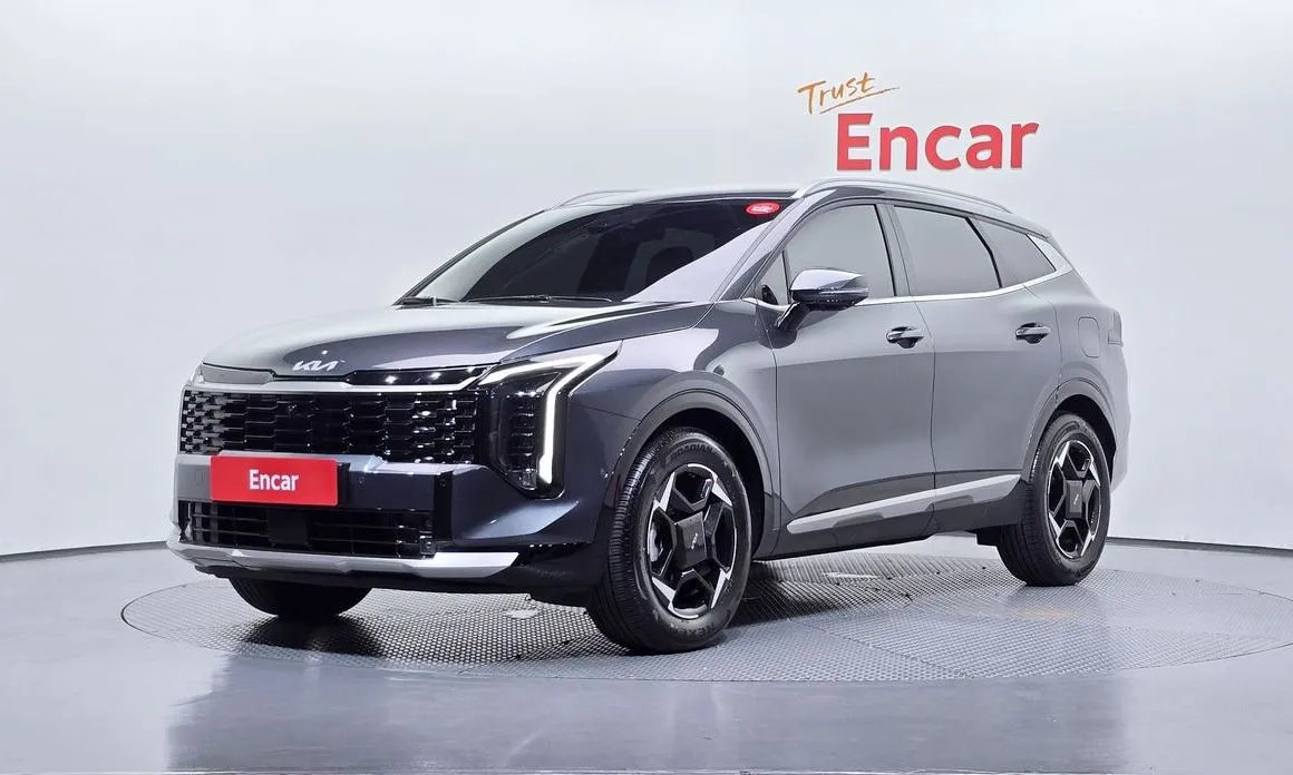 Kia Sportage — фото 1
