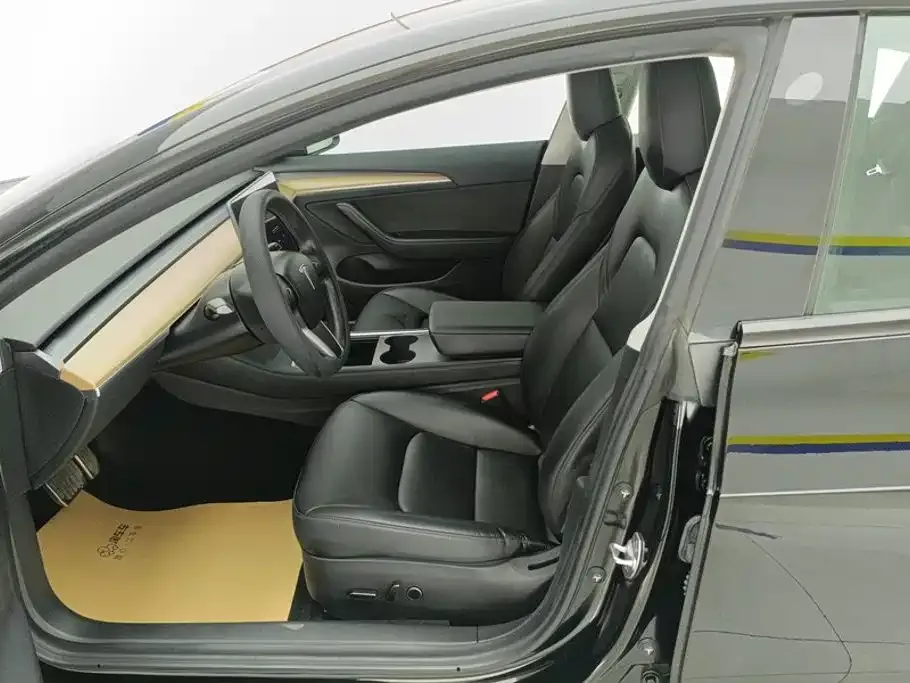 Tesla Model 3 — фото 10