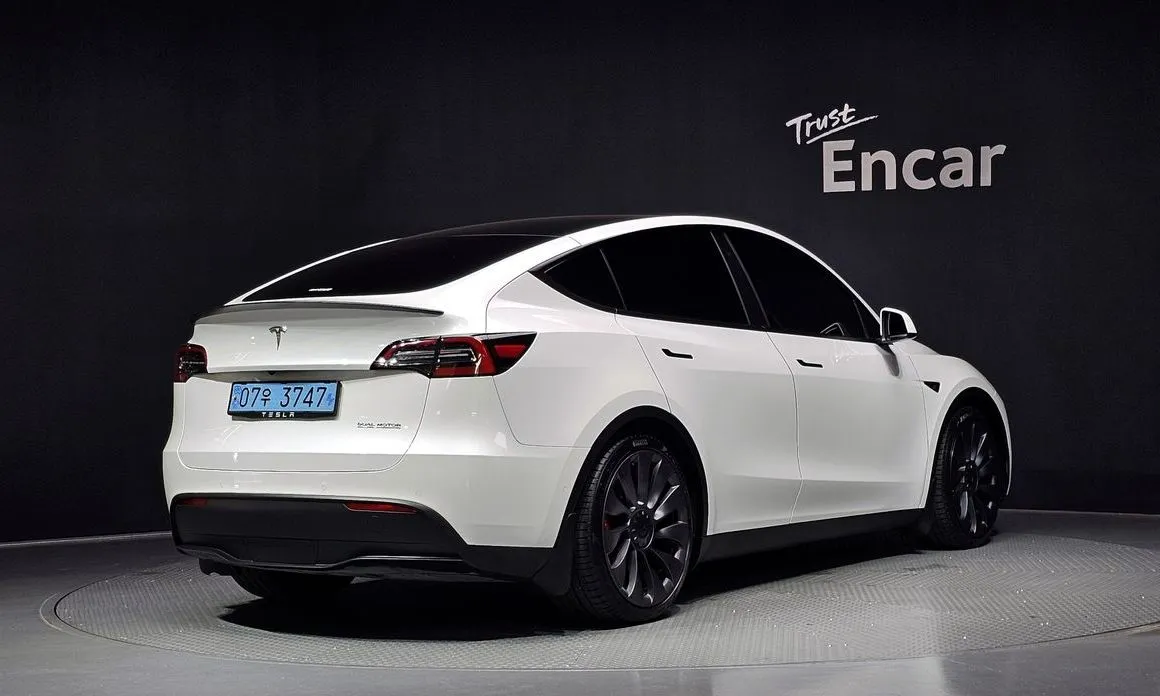 Tesla Model Y — фото 7