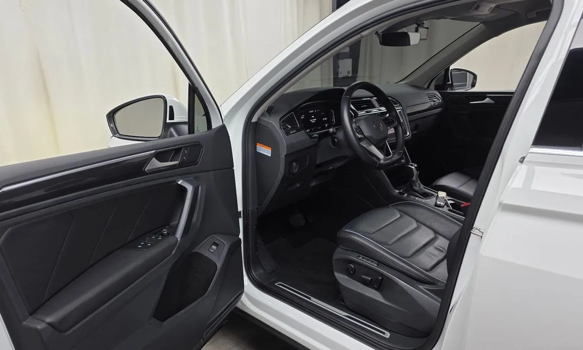 Volkswagen Tiguan — фото 6