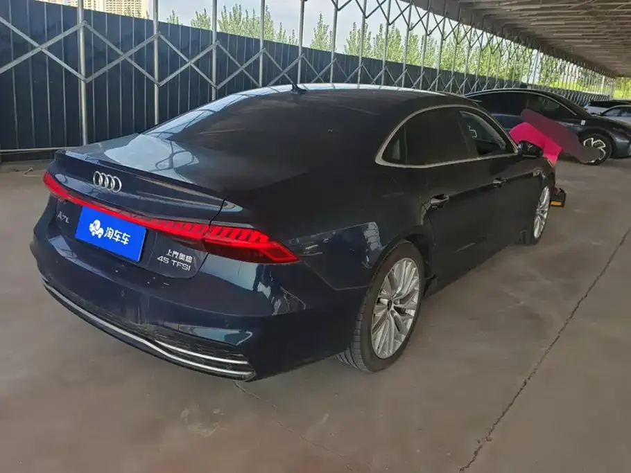Audi A7L — фото 10