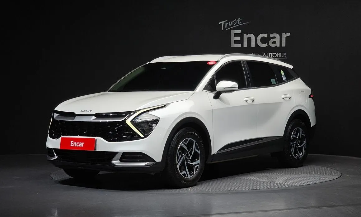 Kia Sportage — фото 1