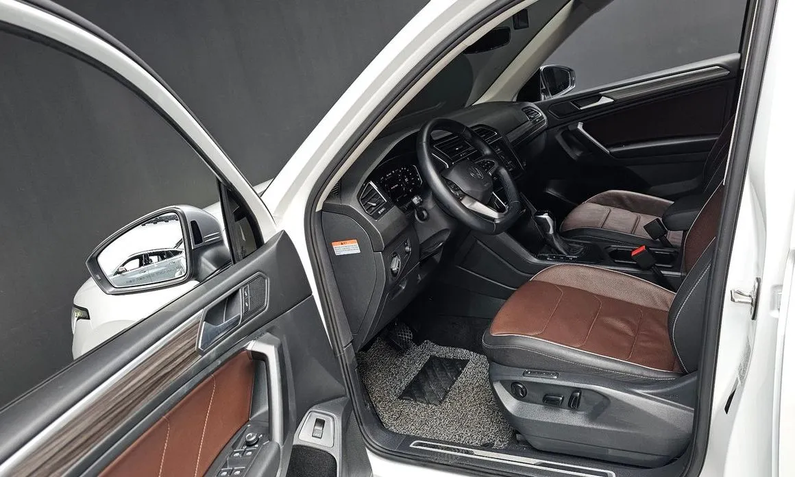 Volkswagen Tiguan — фото 6