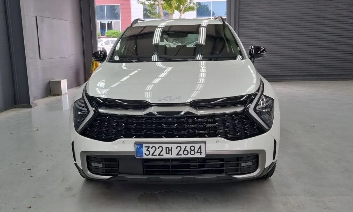 Kia Sportage — фото 9