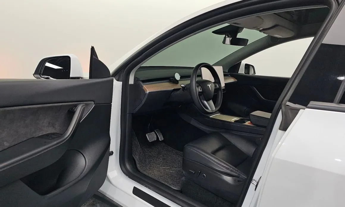 Tesla Model Y — фото 5