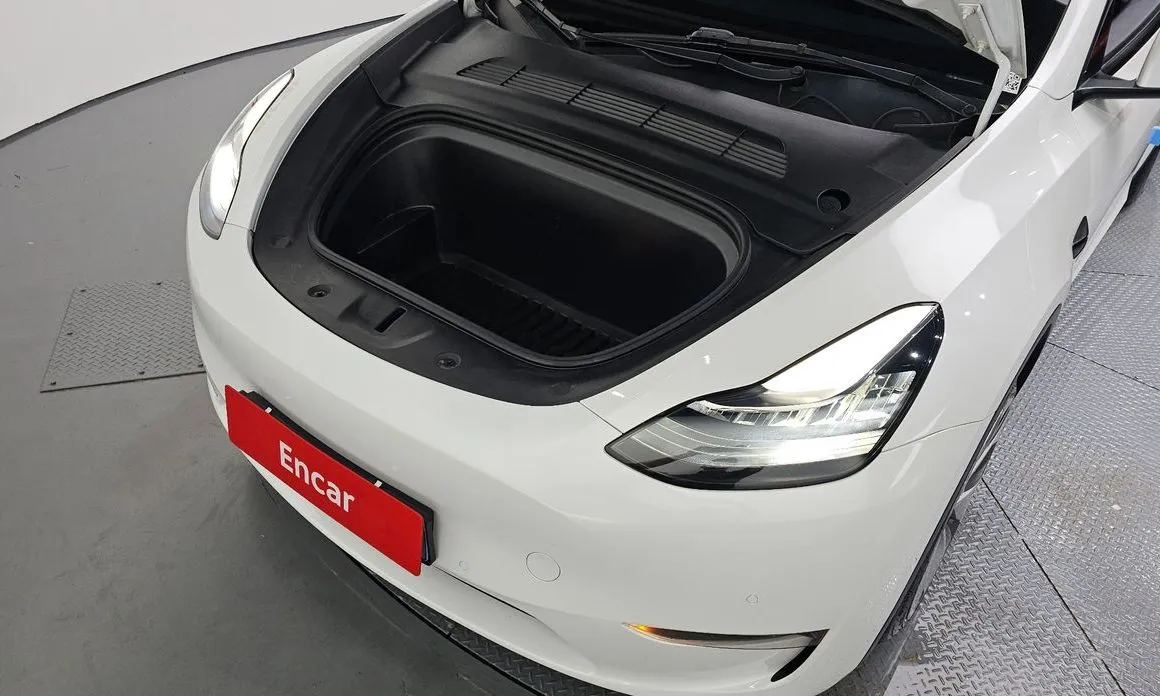 Tesla Model Y — фото 8