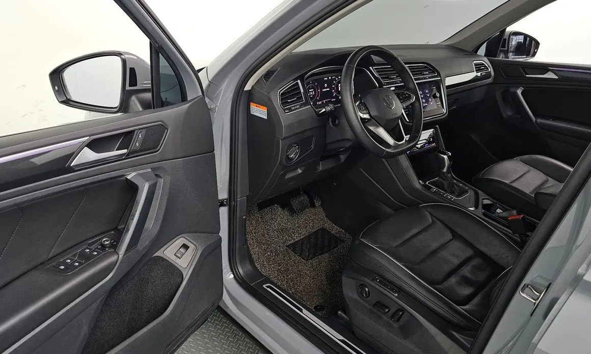 Volkswagen Tiguan — фото 7