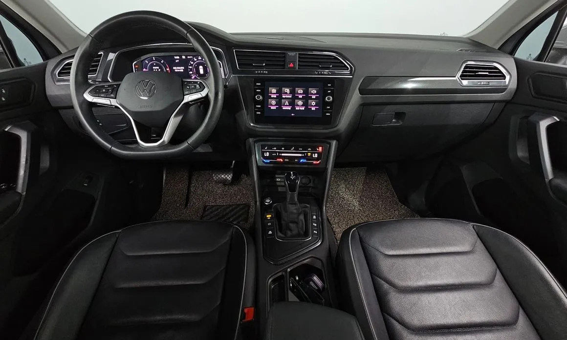Volkswagen Tiguan — фото 4