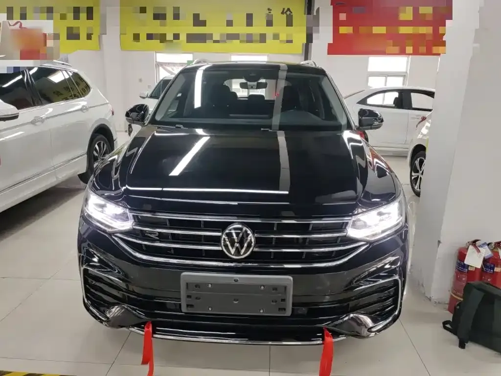 Volkswagen Tiguan L — фото 7