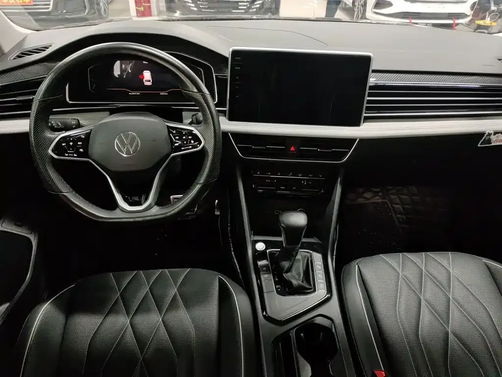 Volkswagen Tiguan L — фото 8