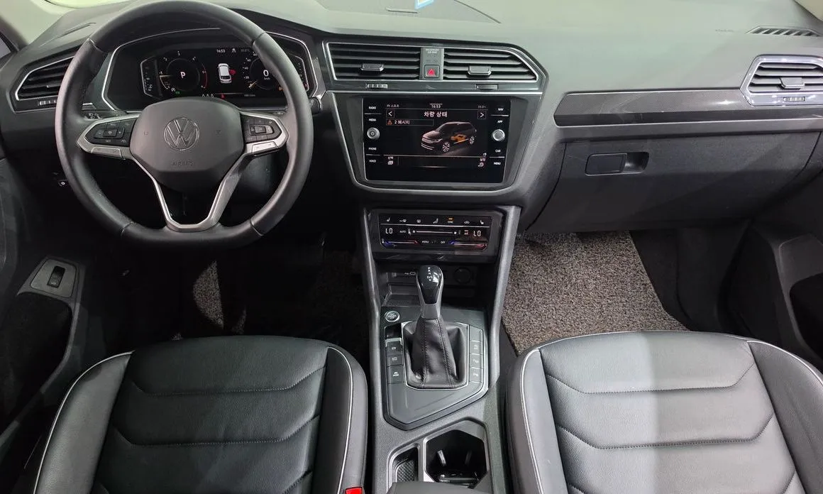 Volkswagen Tiguan — фото 10