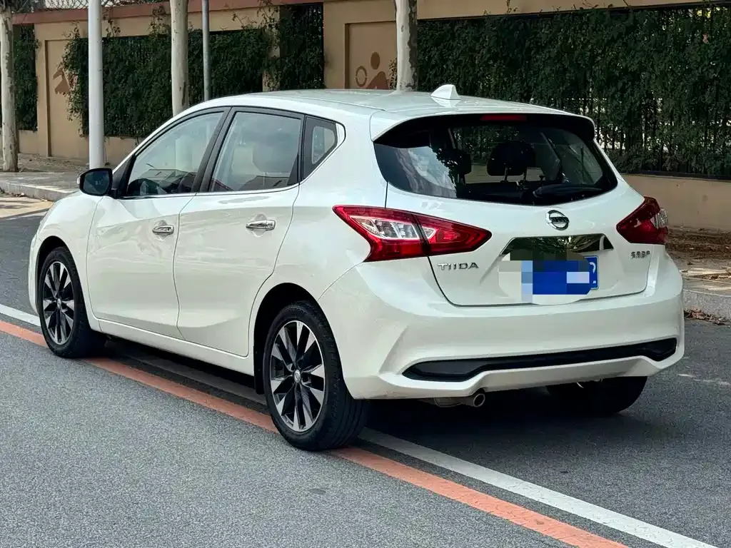 Nissan Tiida — фото 3
