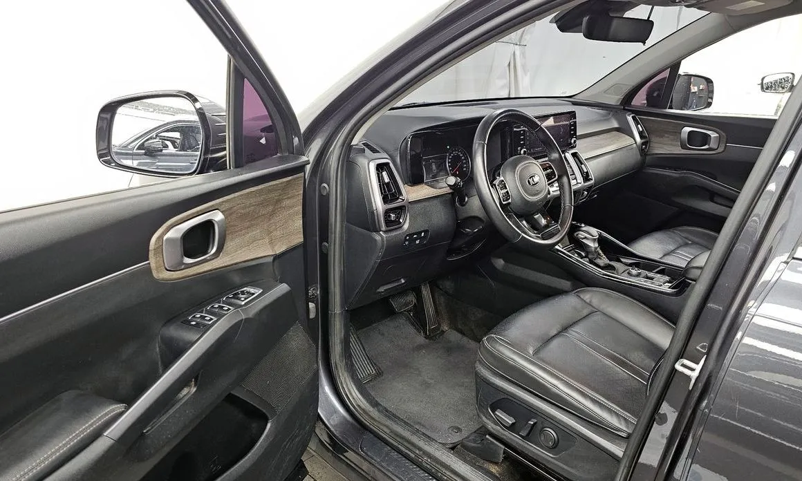 Kia Sorento — фото 7