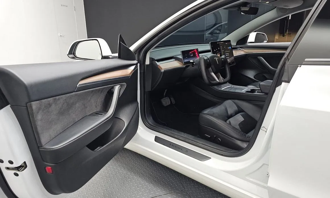 Tesla Model 3 — фото 8