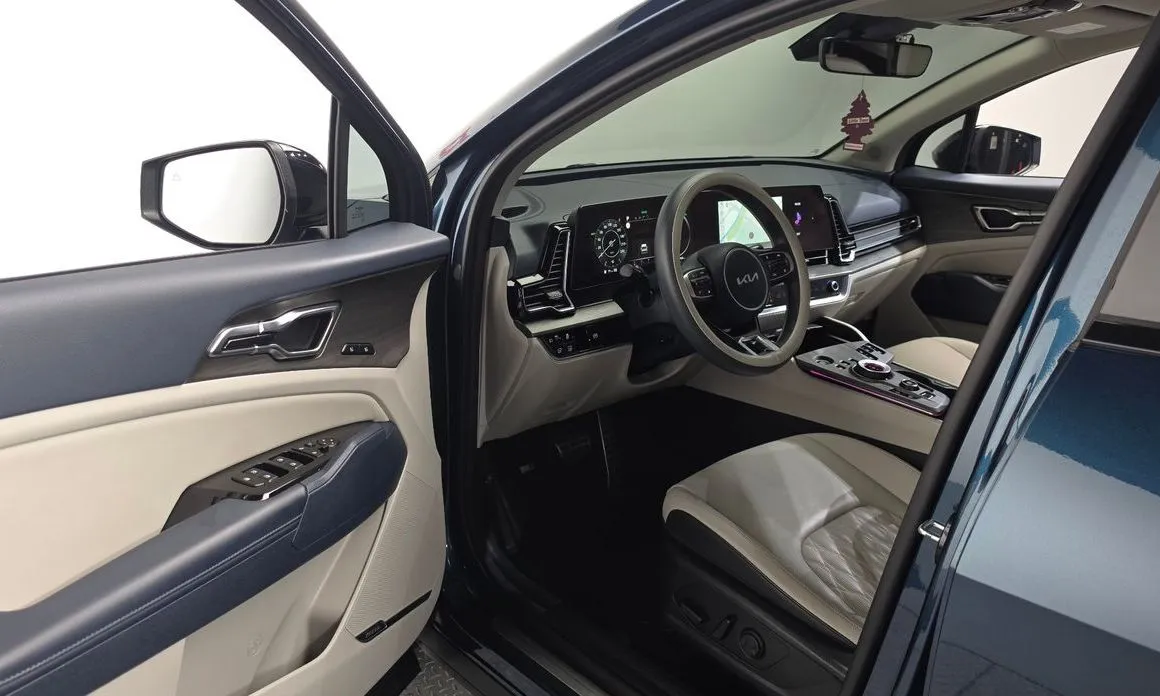 Kia Sportage — фото 8