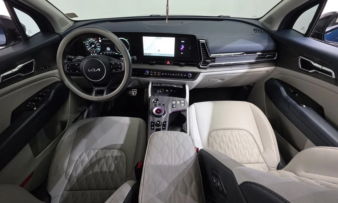 Kia Sportage — фото 9