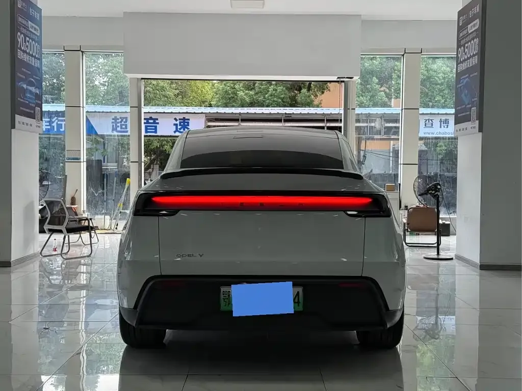 Tesla Model Y — фото 7