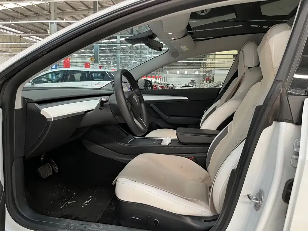 Tesla Model 3 — фото 9