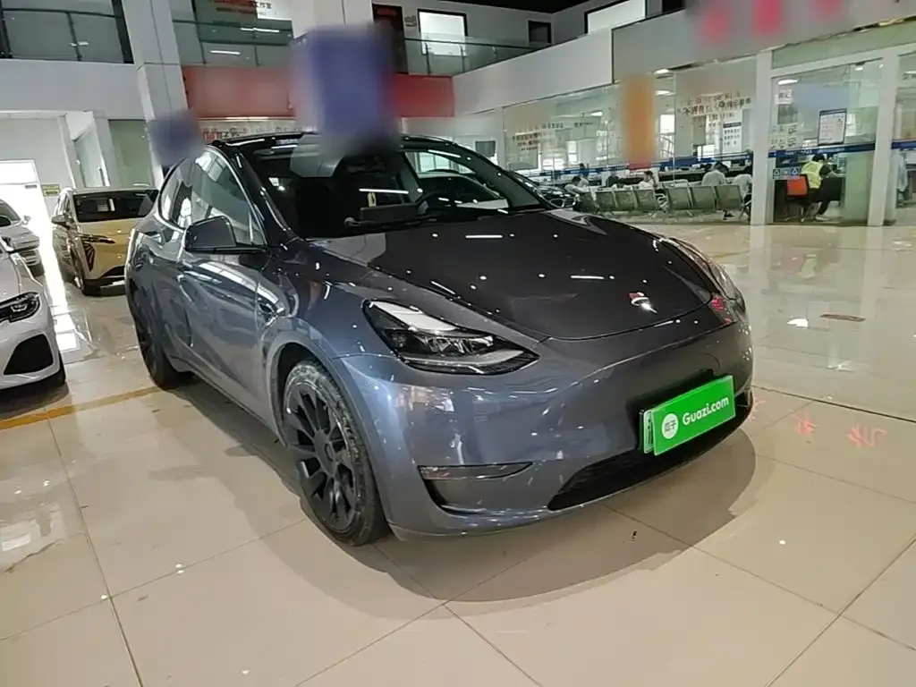 Tesla Model Y — фото 10