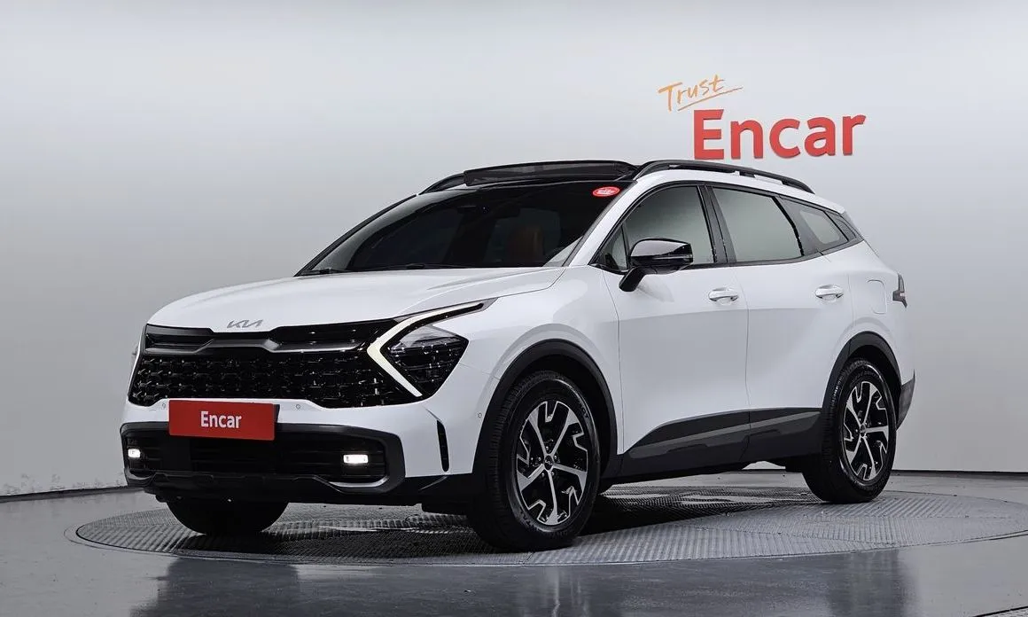 Kia Sportage — фото 1