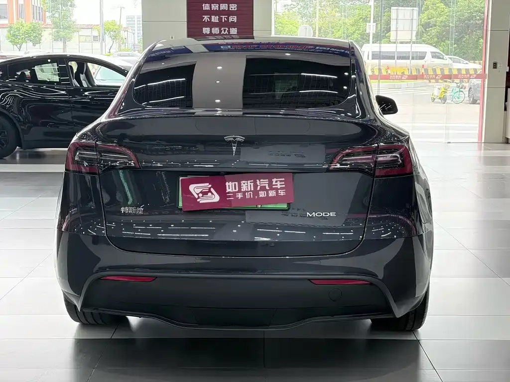 Tesla Model Y — фото 10