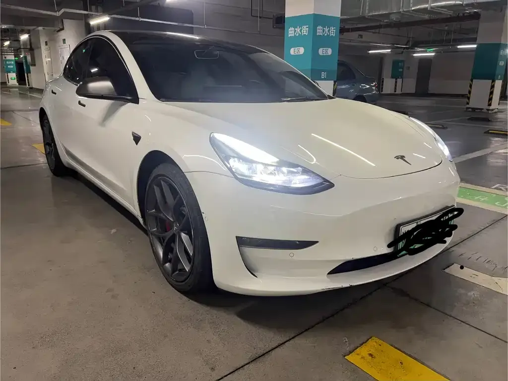 Tesla Model 3 — фото 9