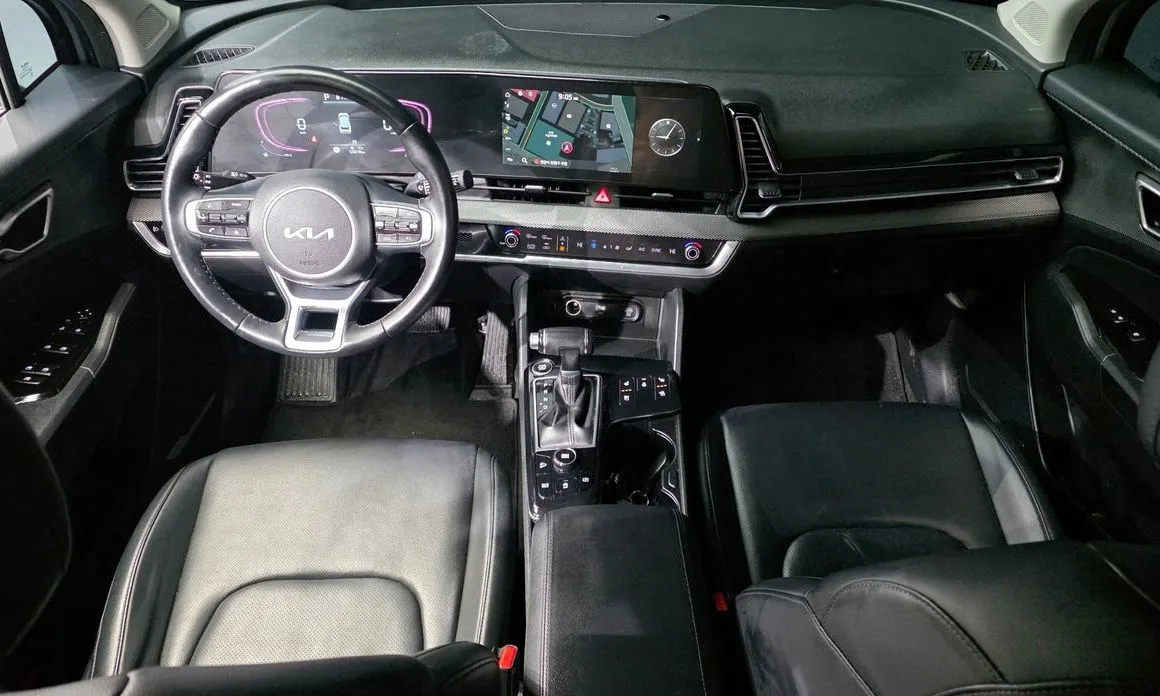 Kia Sportage — фото 8