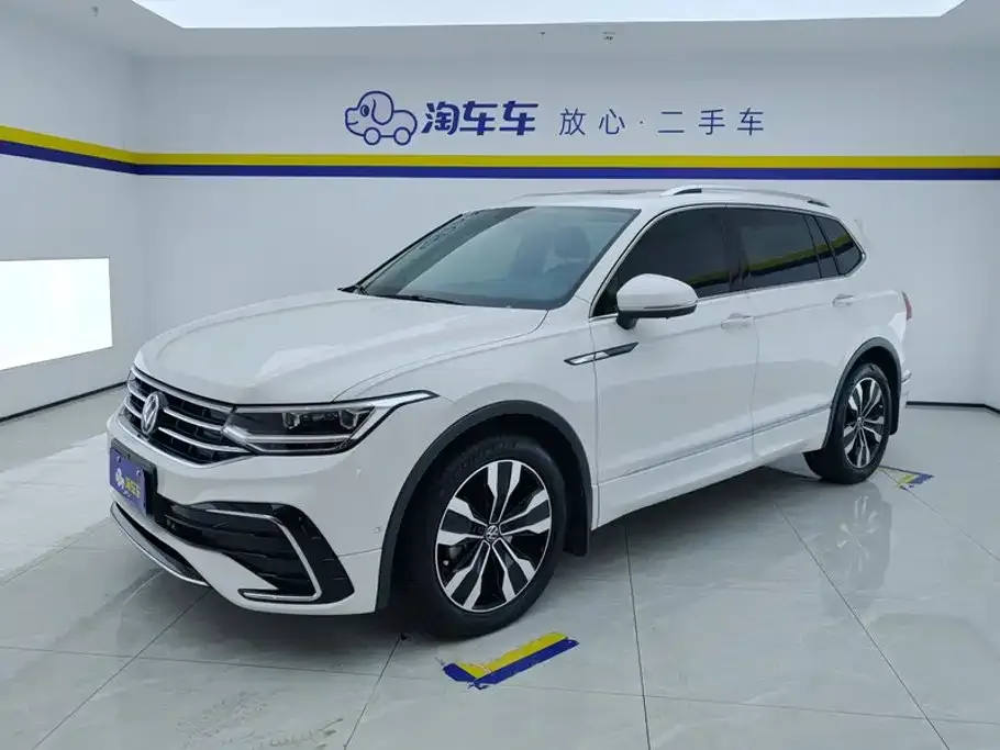 Volkswagen Tiguan L — фото 1