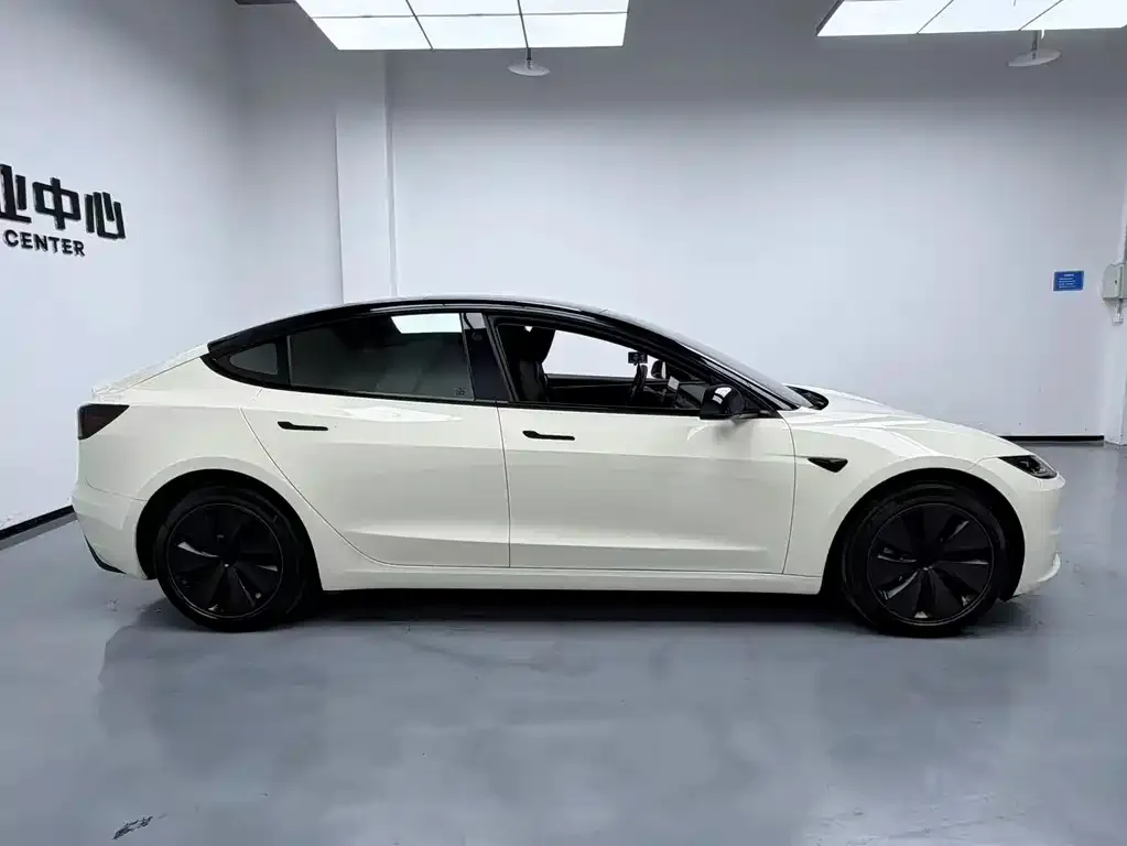 Tesla Model 3 — фото 5