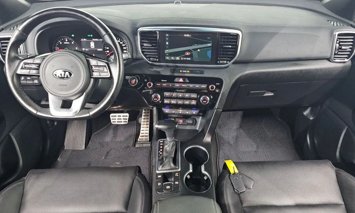 Kia Sportage — фото 10
