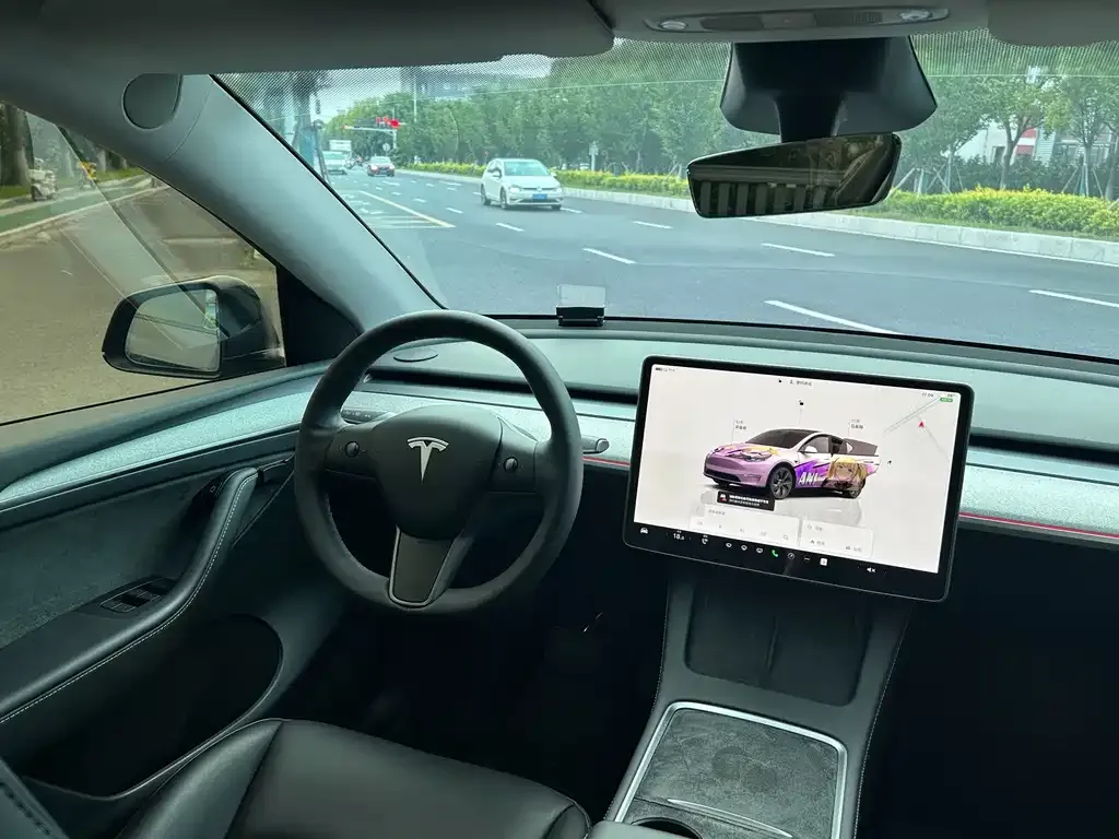 Tesla Model Y — фото 6