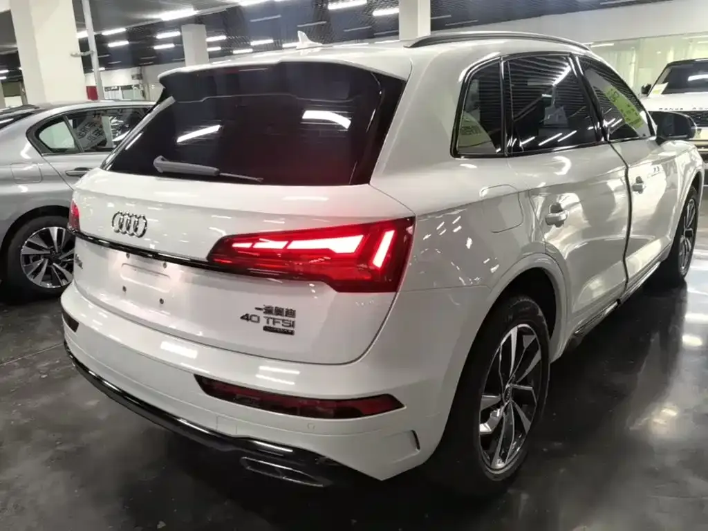 Audi Q5L — фото 5
