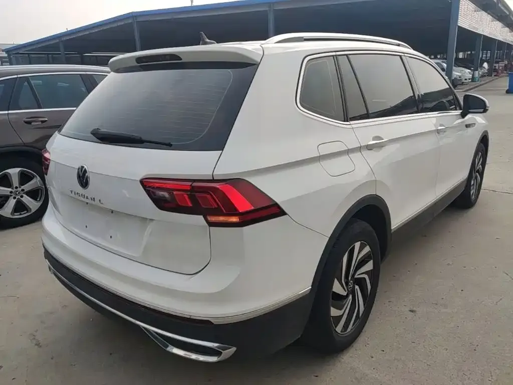 Volkswagen Tiguan L — фото 7