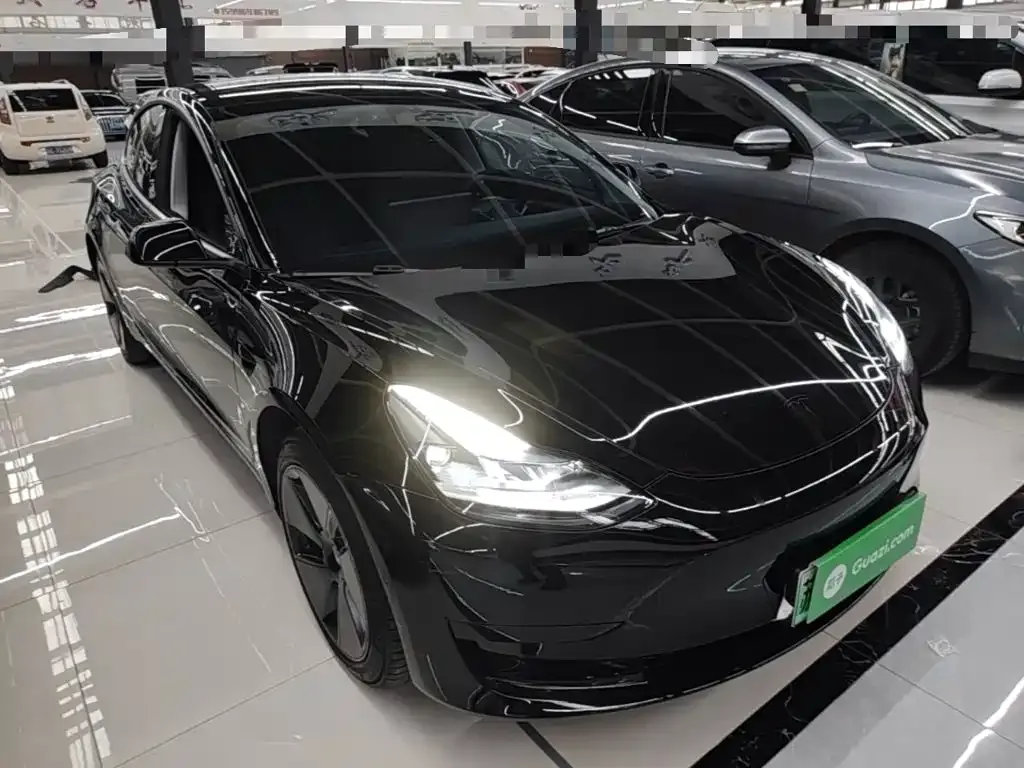 Tesla Model 3 — фото 7