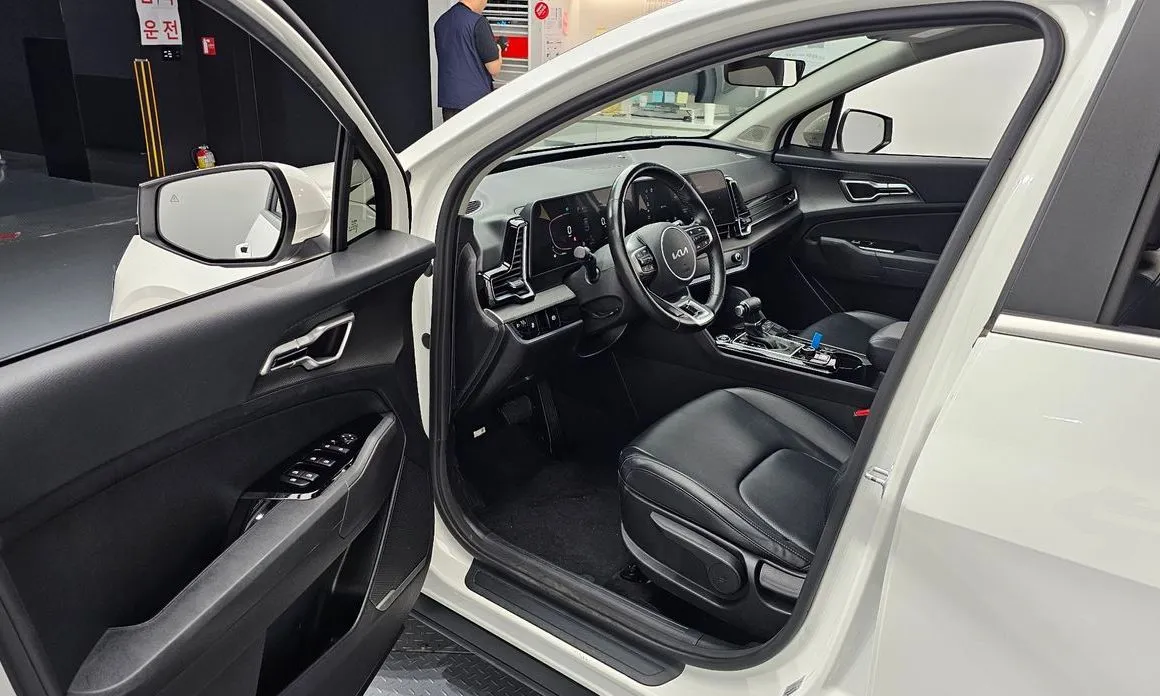 Kia Sportage — фото 10