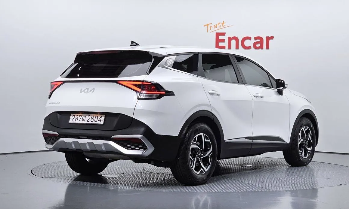 Kia Sportage — фото 7