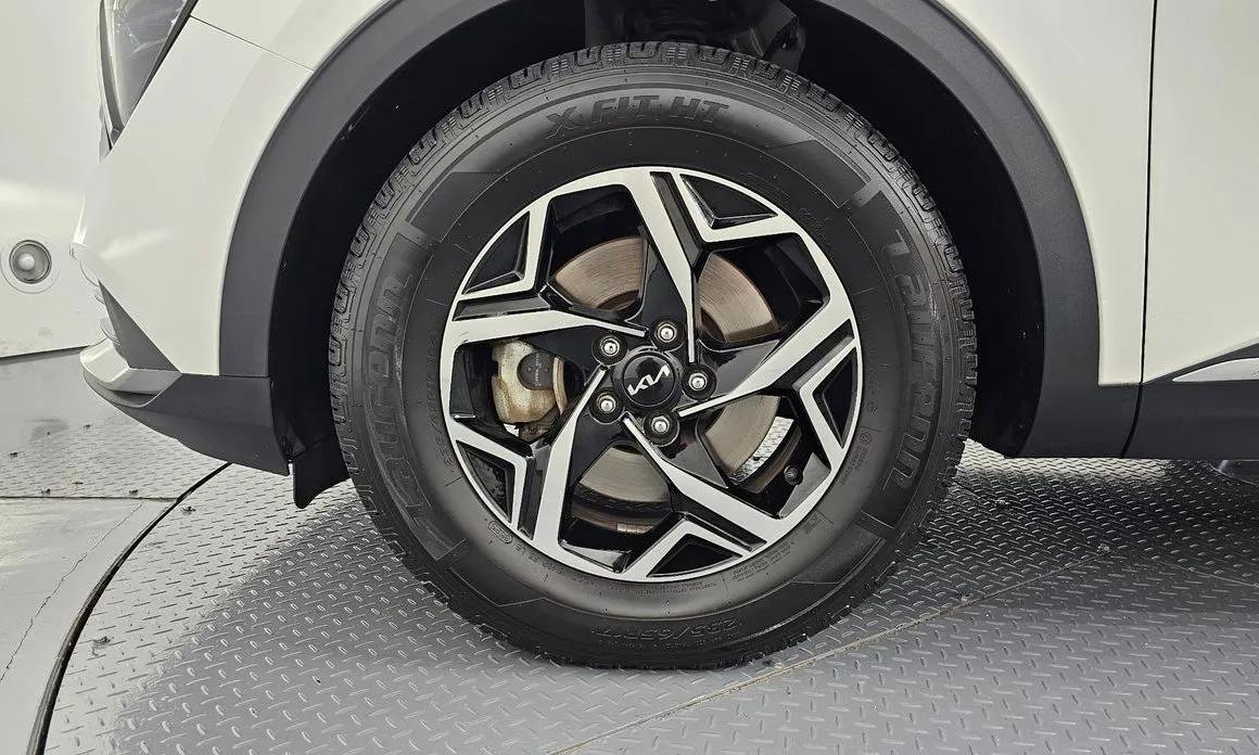 Kia Sportage — фото 9