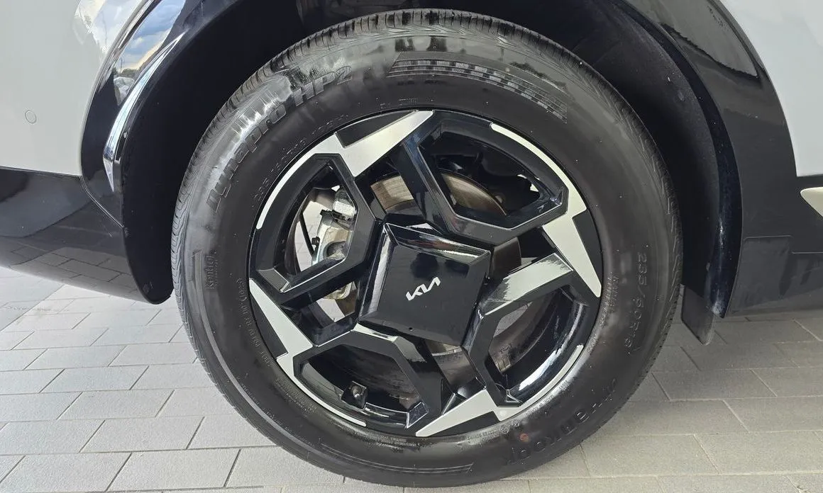 Kia Sportage — фото 8