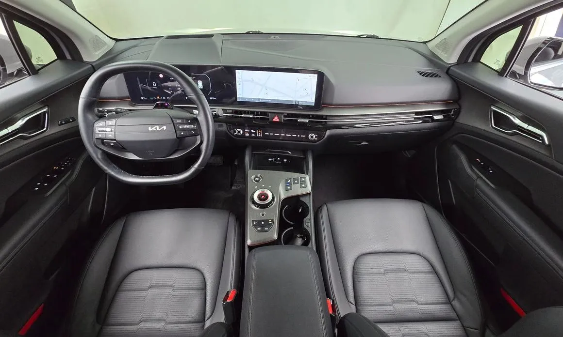 Kia Sportage — фото 10
