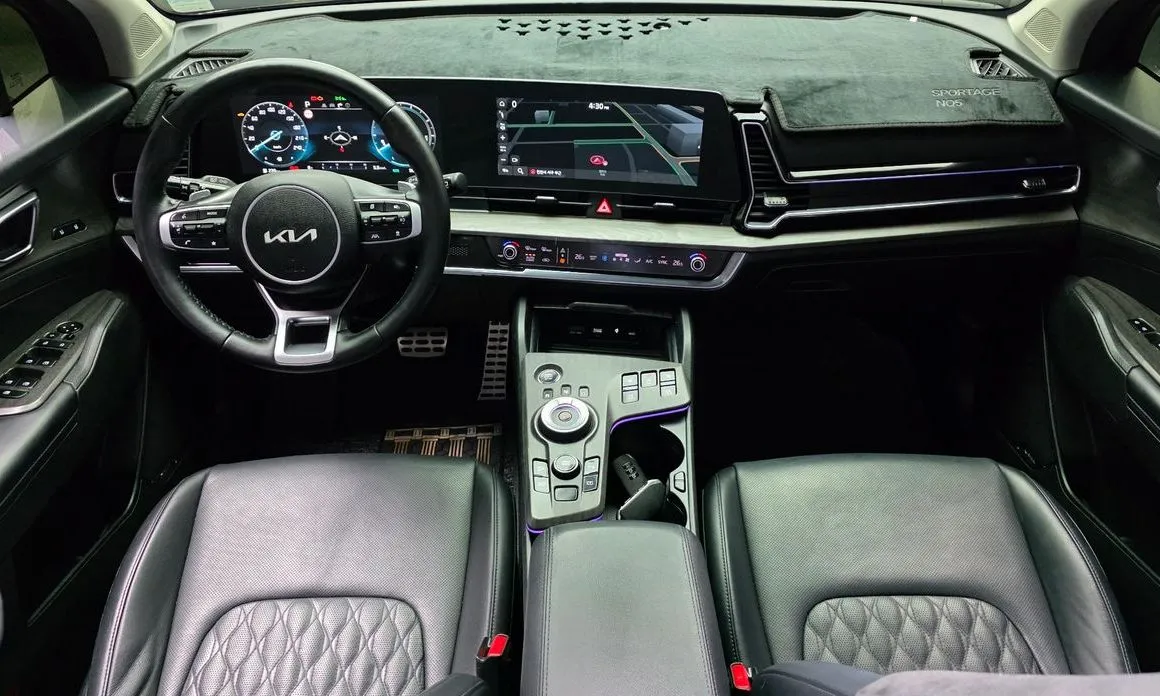 Kia Sportage — фото 10