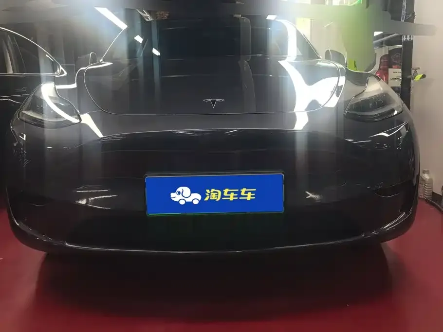 Tesla Model Y — фото 10