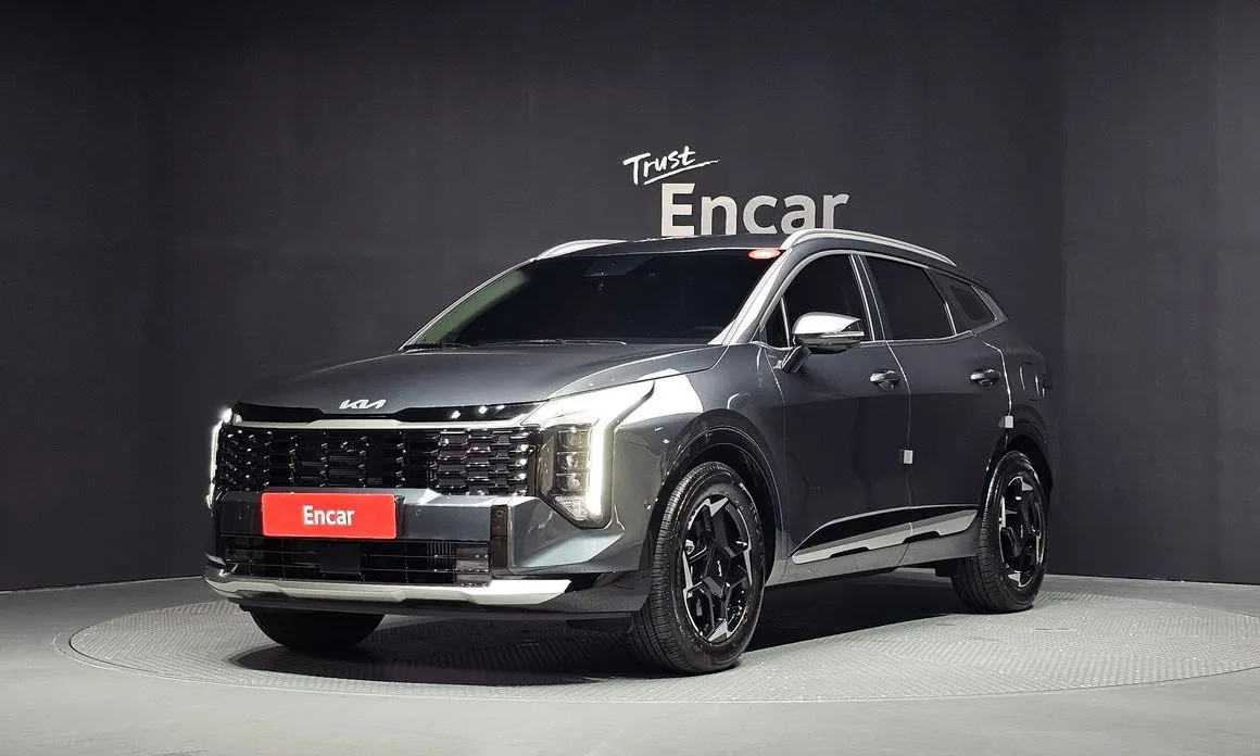 Kia Sportage — фото 1
