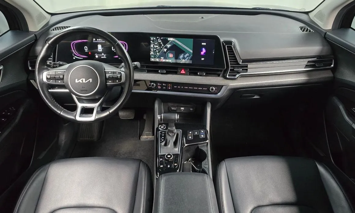 Kia Sportage — фото 10